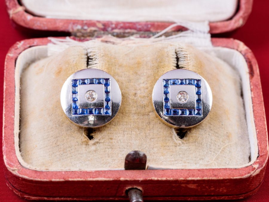 A pair of « calibré » sapphire and diamond earrings.